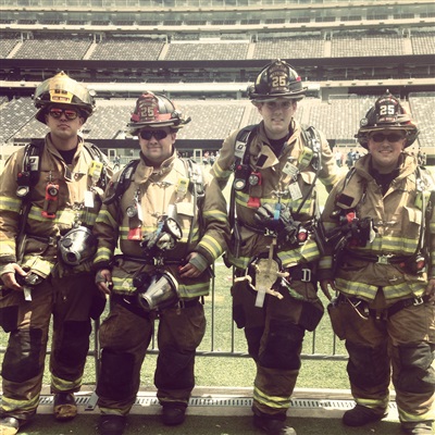 Brian with other firefighters at Yankee stadium