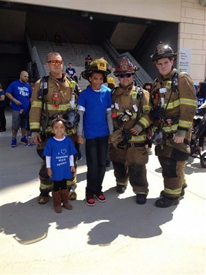 Brian hanging with other firefighters